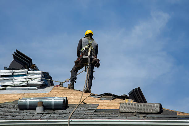 Professional Roof Replacement technician working in Okeechobee, FL